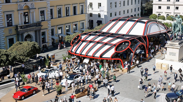 The Porsche 911, an oversized car, has become a crowd favorite at the IAA Open Space