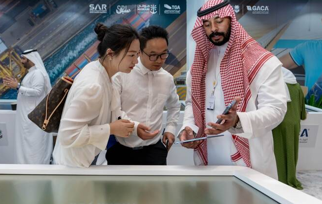 **Headline:** “Saudi Arabia’s Vision 2030: Pride, Progress,