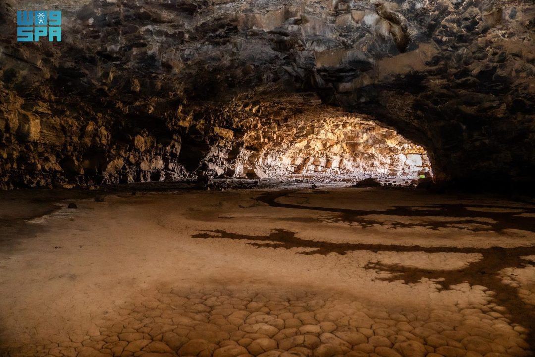 Which Cave in the Kingdom Shows Evidence of a 10,000-Year-Old Human Settlement?